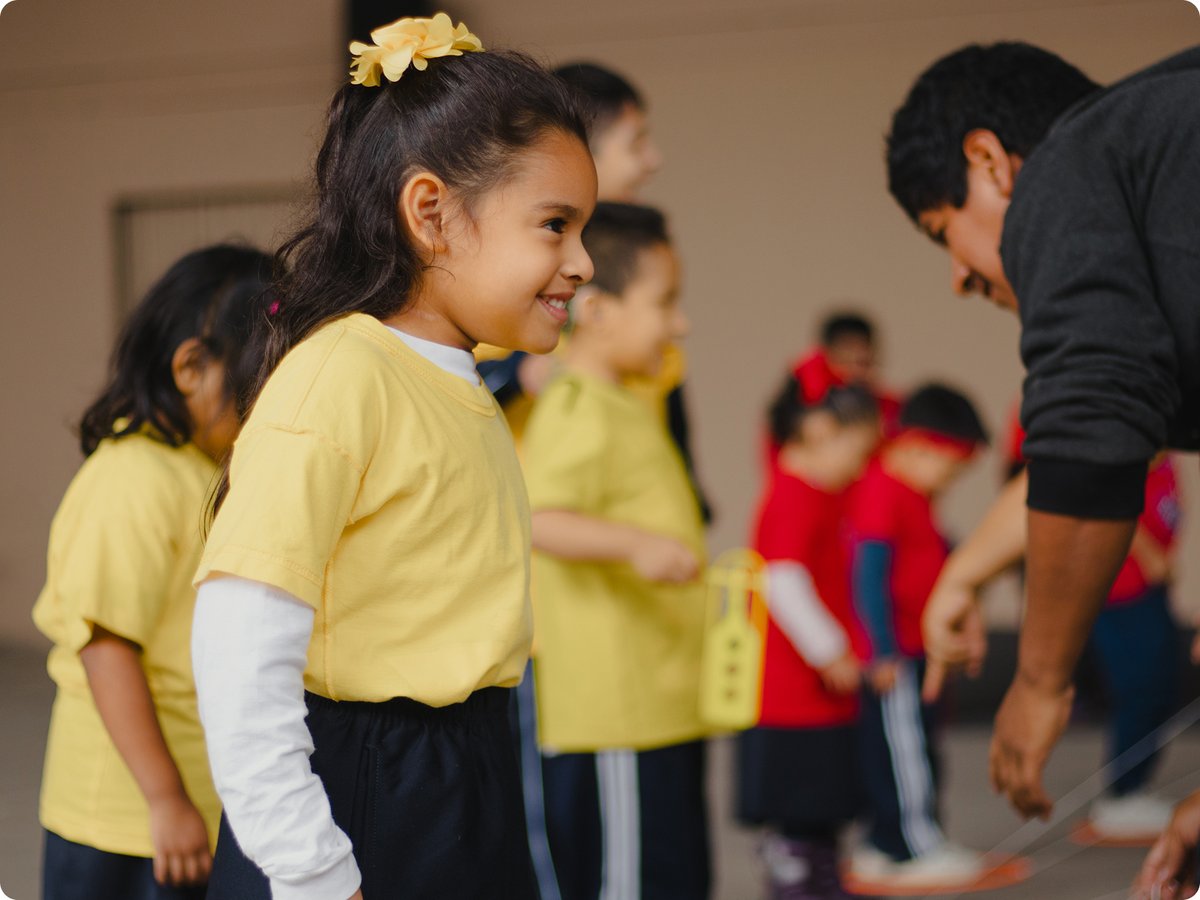 Smiling girl in competition (Yellow team)